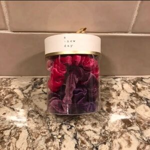 Velvet hair twisters, light pink, bright pink , purple and silk purple.